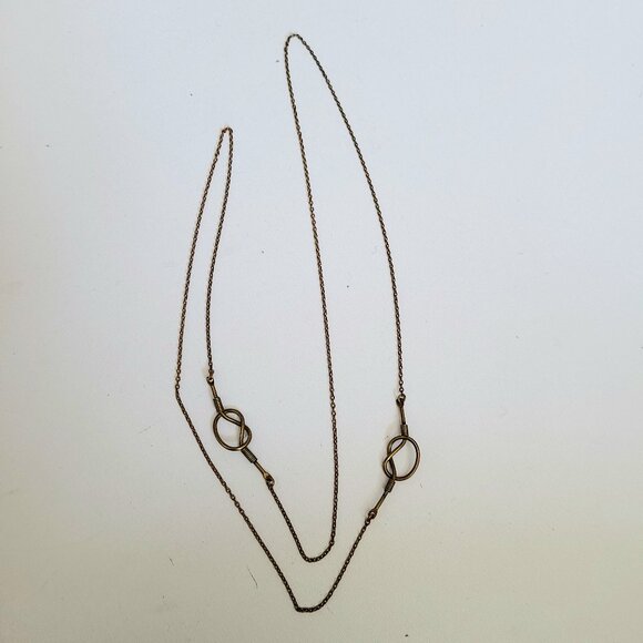 Brass long chain with knot details. - Picture 2 of 5